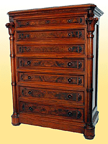 A Renaissance Revival chest of drawers.